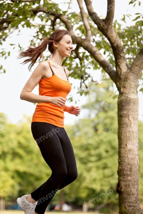 Preview: Beautiful Happy Woman Running At The Park