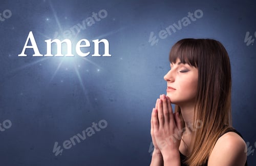 Preview: Young Woman Praying On A Blue Background With The Word Amen Written Above Her