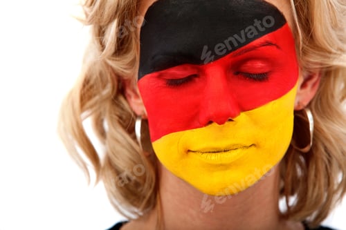 Preview: Portrait Of A Woman With The German Flag Painted On Her Face Isolated Over White