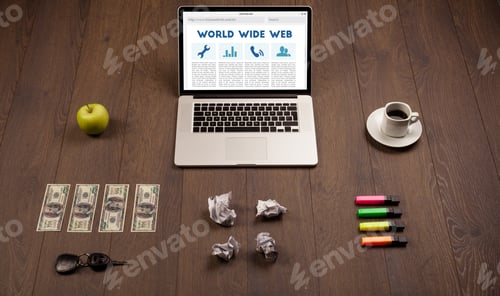 Preview: Laptop Computer On Wooden Desk With Office Suplies