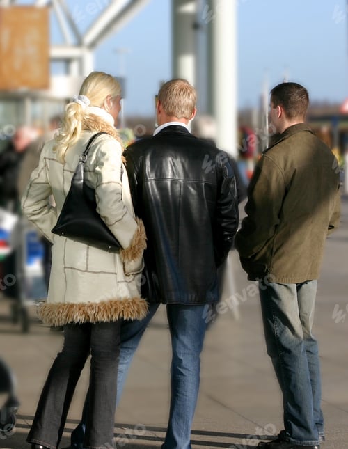 Preview: 3 People Waiting Outside An Airport In London