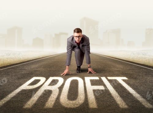 Preview: Young Determined Businessman Kneeling Before Profit Sign