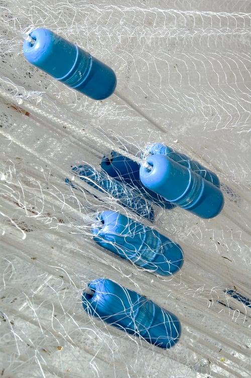 Preview: Blue Floats In White Fishing Net