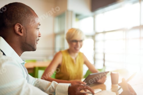 Preview: Two Creative Millenial Small Business Owners Working On Social Media Strategy Using A Digital