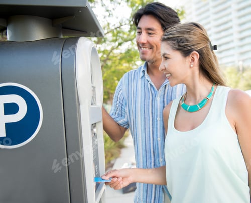 Preview: Couple Paying For The Parking Lot With A Credit Card