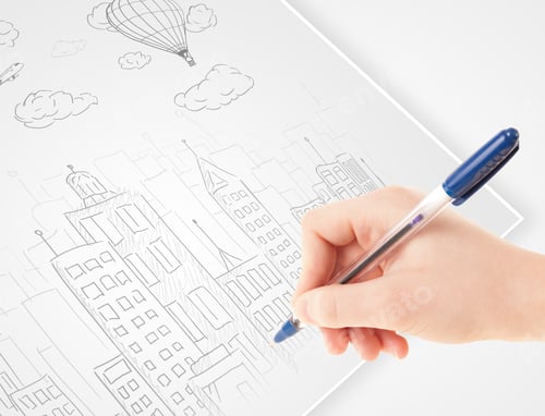Preview: A Person Drawing Sketch Of A City With Balloons And Clouds On A Plain Paper