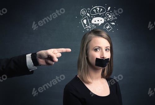 Preview: Caucasian Business Hand Pointing At Stressed Female Employee With Drawn Question, Explamation Marks