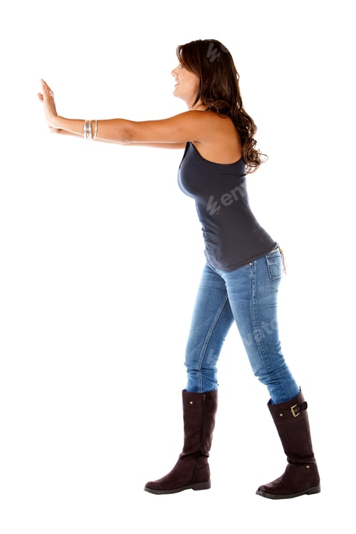 Preview: Woman Pushing An Imaginary Object Isolated Over A White Background