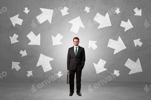 Preview: Handsome Businessman Standing In Front Of A Wall With Chalk Drawn Arrows