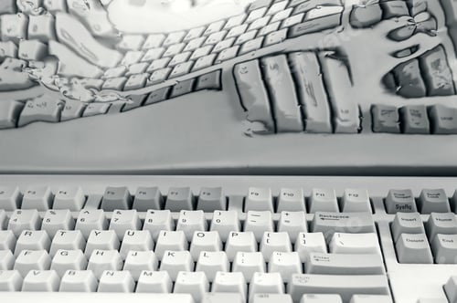 Preview: Computer Keyboard And Its Distorted Reflection