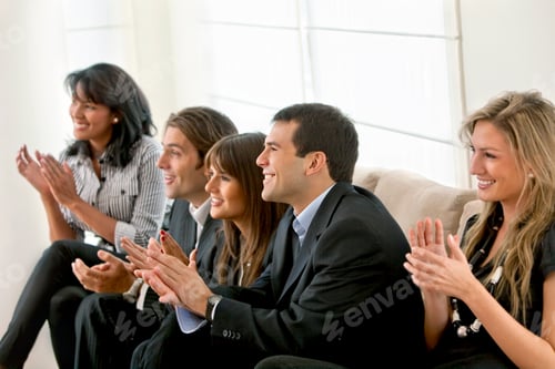 Preview: Happy Business Group Applauding At The Office