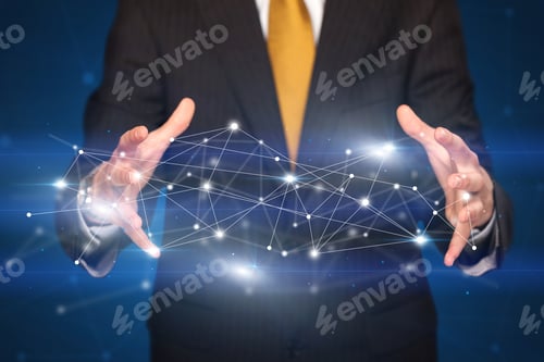 Preview: Businessman With Network Connection Concept Between His Hands