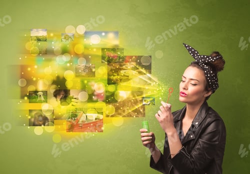 Preview: Cute Girl Blowing Colourful Glowing Memory Picture Concept On Green Background
