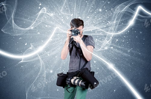 Preview: A Young Amateur Photographer With Professional Photographic Equipment Taking Picture In Front Of