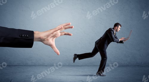 Preview: Young Miniature Businessman Running From A Big Hand With Blue Background