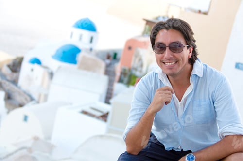 Preview: Happy Man In Santorini Enjoying His Summer Holidays