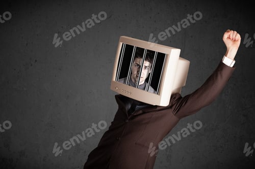 Preview: Business Man With Monitor Screen On His Head Traped Into A Digital System Concept