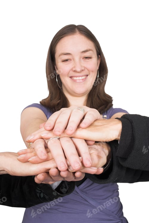 Preview: Business Team With Their Hands Together - Face Of One Of The Women