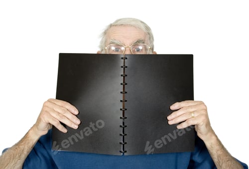Preview: Casual Teacher With Black Notebook Over A White Background