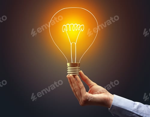 Preview: Hand Holding Light Bulb On Dark Background, New Idea Concept