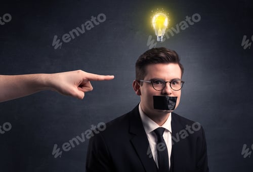 Preview: Caucasian Hand Pointing At Businessman With A Lightbulb Above His Head