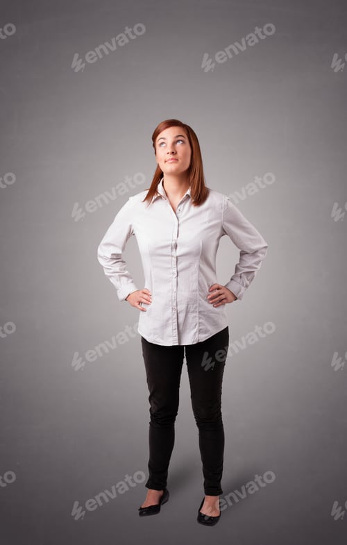 Preview: Beautiful Young Woman Standing And Thinking With Copy Space