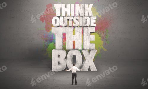 Preview: Colorful Wall With Illustrated Quote Saying Think Outside The Box For A Small Businessman Standing