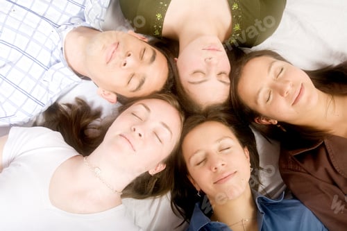 Preview: Friends With Heads Together While Sleeping On The Floor - Soft Focus