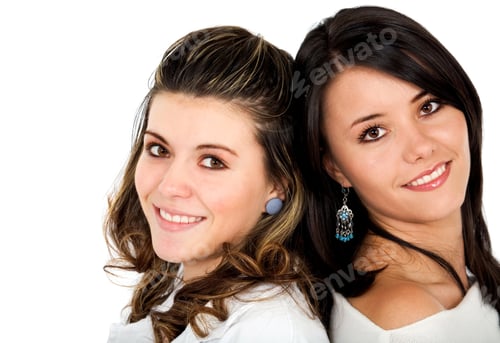 Preview: Two Smiling Young Women Posing Together on White