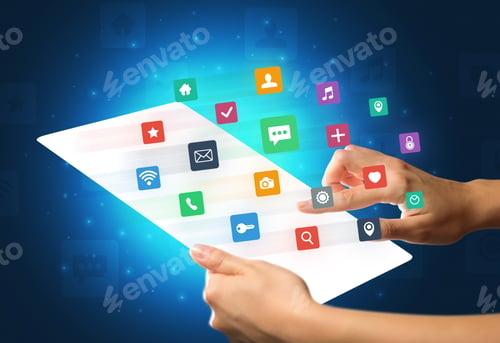 Preview: Young Female Hand Holding A Tablet With Colorful Mixed Media Icons