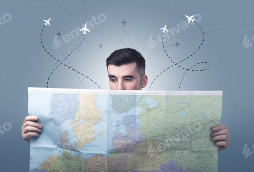 Preview: Handsome Young Man Holding A Map With Little Planes And Their Paths Above Him