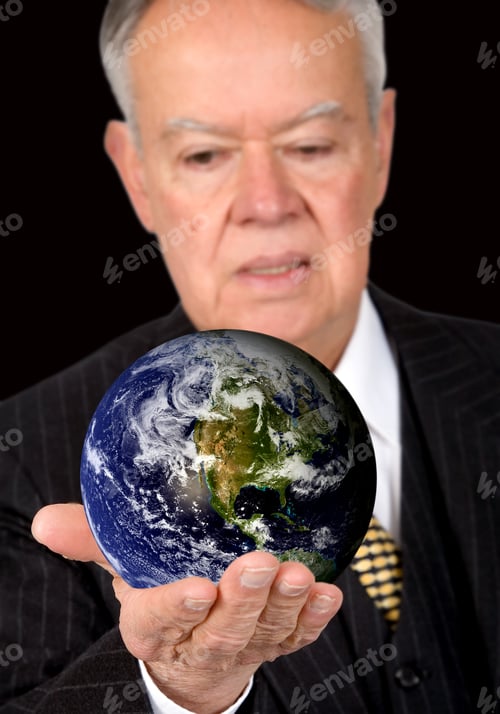 Preview: Business Man Holding A Globe Over A Black Background - Globe Is From Http://Www.Nasa.Gov