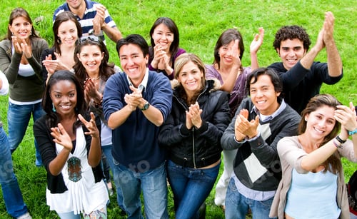 Preview: Happy Group Of Friends Smiling And Clapping Outdoors
