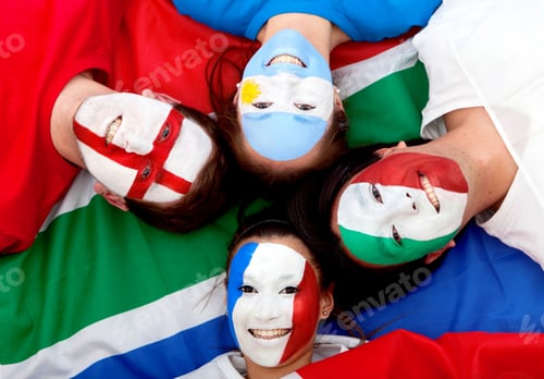 Vista previa: Group Of Football Fans With Painted Faces Lying Over The South African Flag