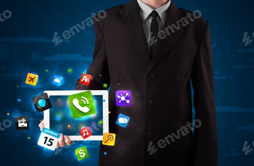 Preview: Young Businessman Holding A Tablet With Modern Colorful Apps And Icons