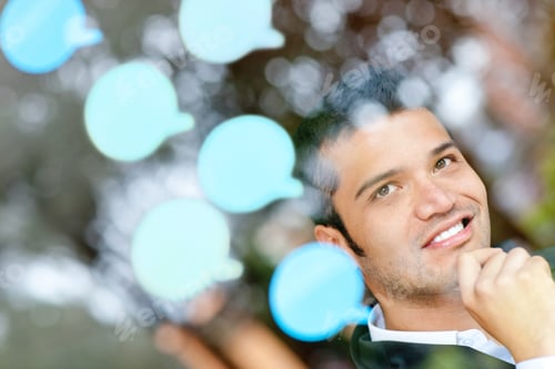 Preview: Pensive Business Man With Thought Bubbles Around His Head