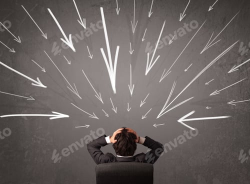 Preview: Business Man With Hand Drawn Arrows Pointing At His Head Concept