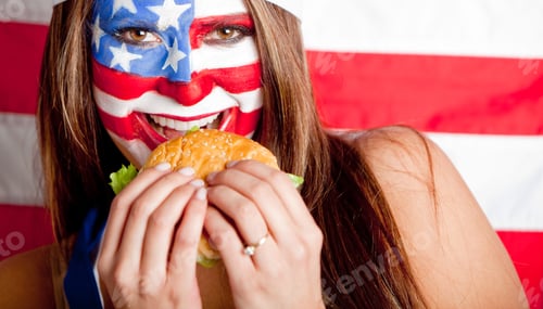 Preview: American Woman Eating A Hamburger ���� Fast Food Concepts