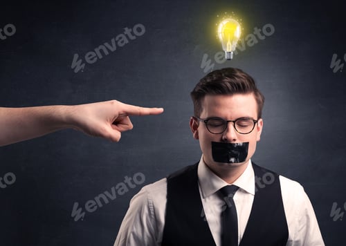 Preview: Caucasian Hand Pointing At Businessman With A Lightbulb Above His Head