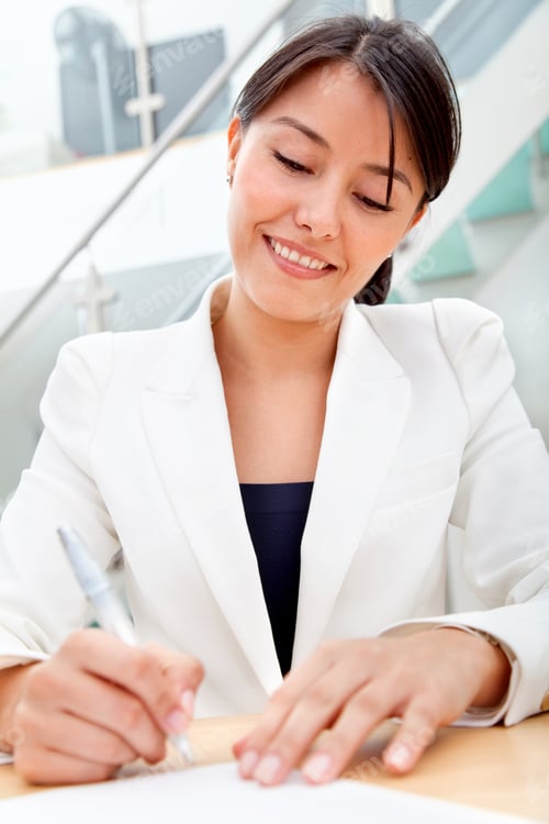 Preview: Business Woman Signing A Contract At The Office