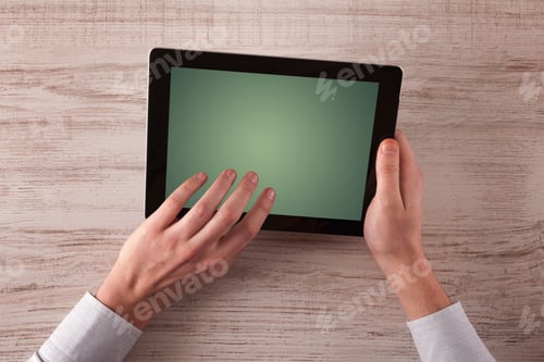 Preview: Caucasian Business Hands Holding And Working On Plain Tablet