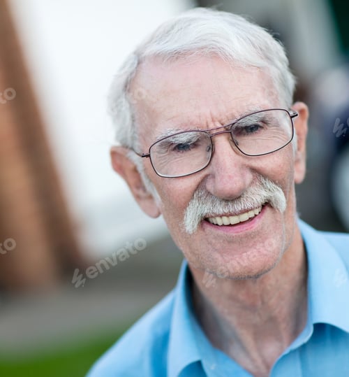 Preview: Portrait Of A Happy Old Man Outside His House