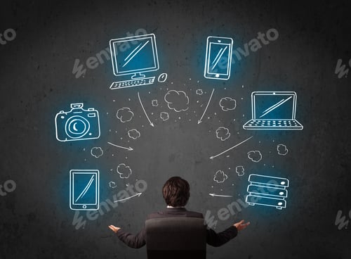 Preview: Young Businessman In Office Chair Sitting In Front Of A Wall With Glowing Drawn Multimedia Icons