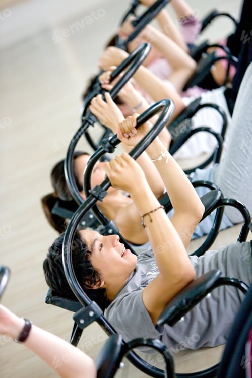 Preview: Image Of A Group Working Out On An Abs Machine