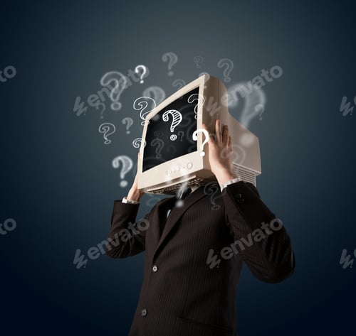 Preview: Businessman With A Computer Monitor Head And Question Marks