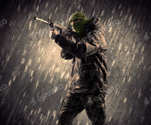 Preview: Close Up Of An Armed Terrorist Man With Mask On Rainy Background