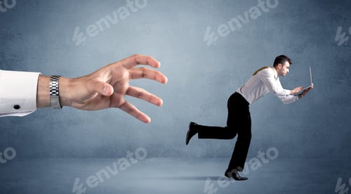 Preview: Young Miniature Businessman Running From A Big Hand