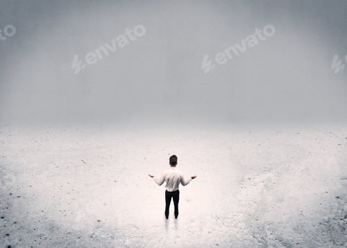 Preview: An Adult Elegant Businessman Standing In The Middle Of Nowhere In Empty Grey Concrete Space