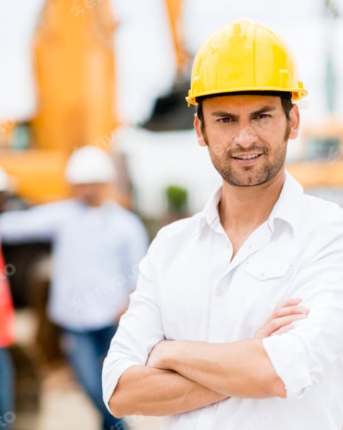 Preview: Male Architect With Arms Crossed Working At A Construction Site