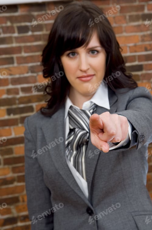 Preview: Businesswoman Pointing At You.